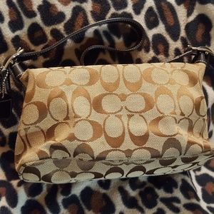 Authentic coach signifies  mini evening bag